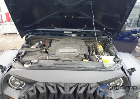 2013 Jeep Wrangler Unlimited Freedom Edition из США, поврежденный, VIN 1C4BJWDG4DL586397